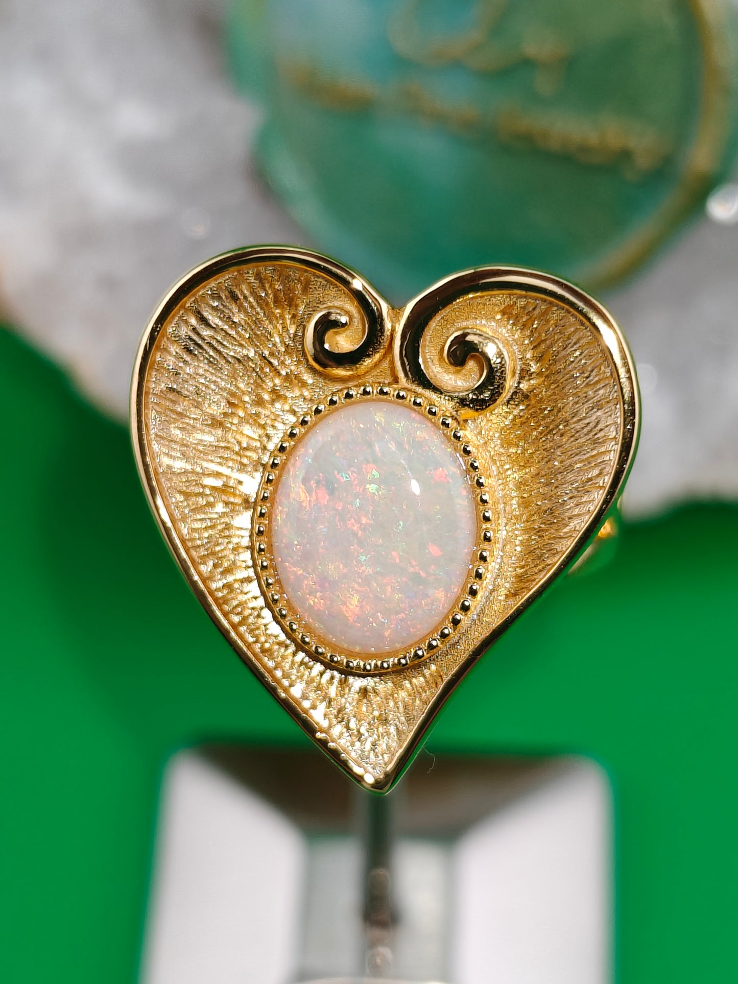 heart-shaped gold plated silver ring with an opal stone 