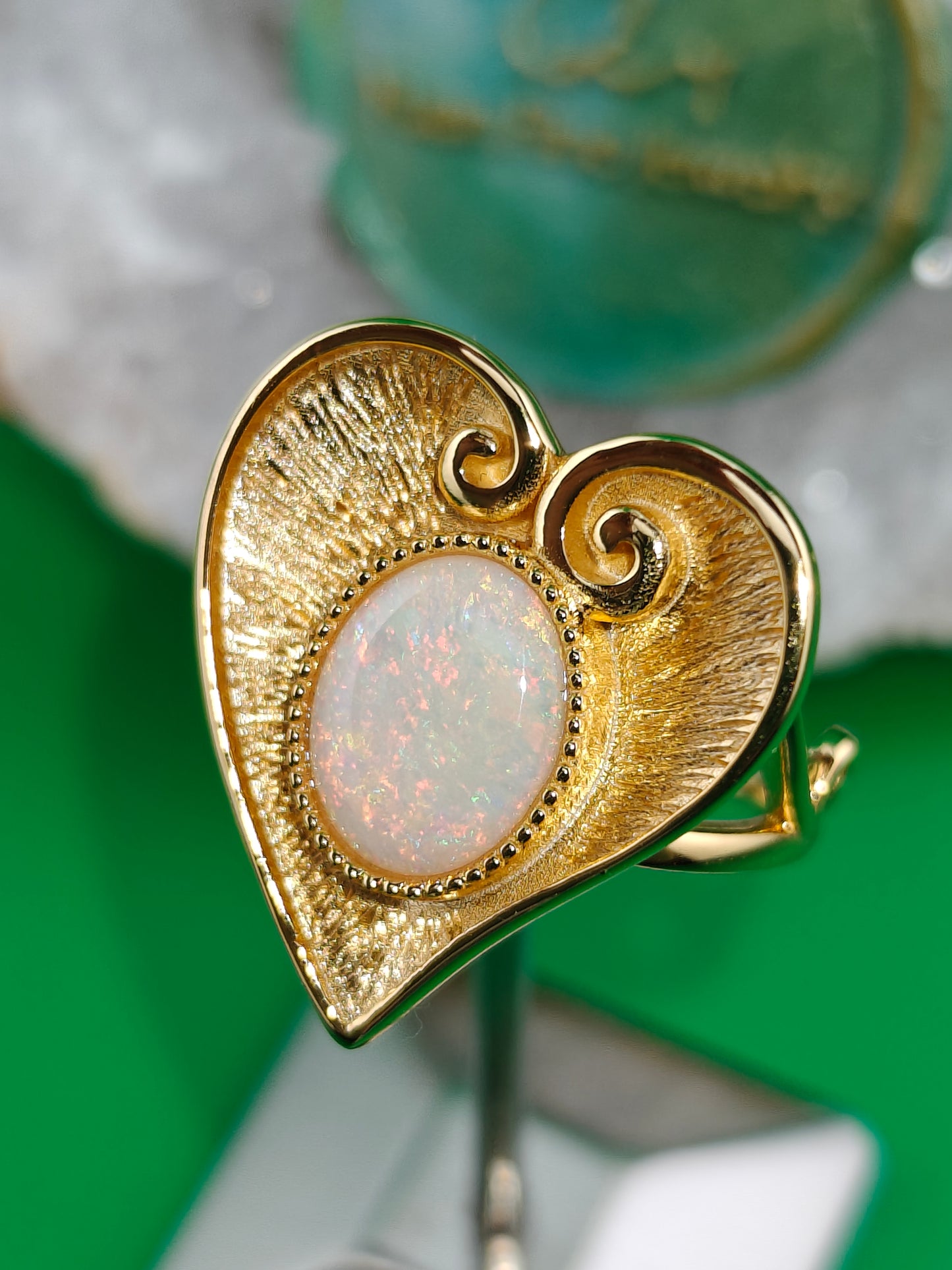heart-shaped gold plated silver ring with an opal stone 