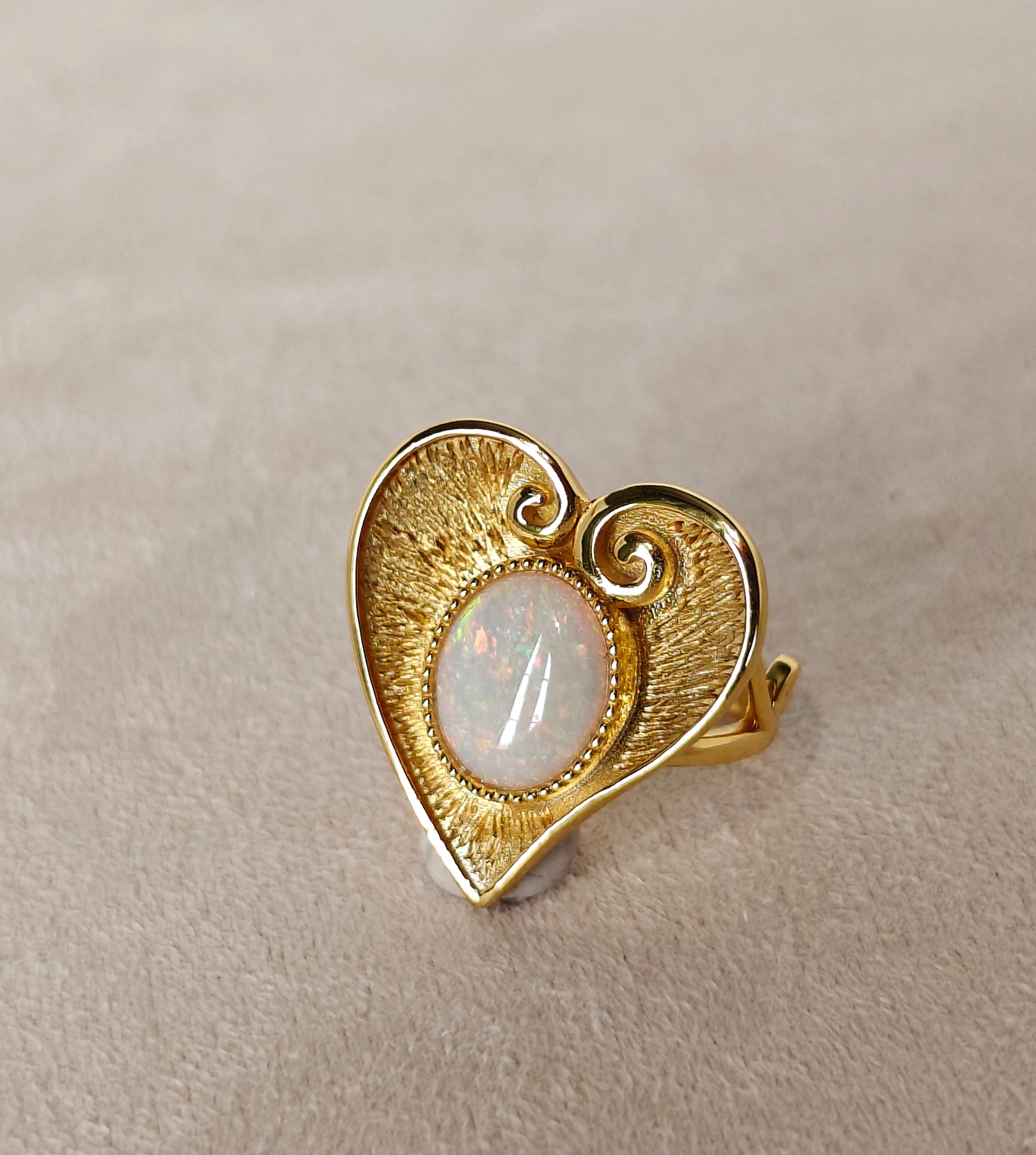 heart-shaped gold plated silver ring with an opal stone 