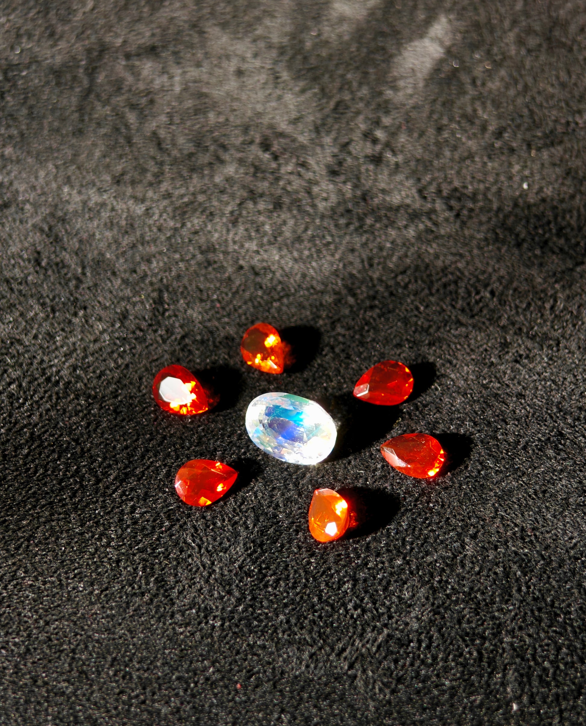 Orange red faceted pear shape Mexican fire opal